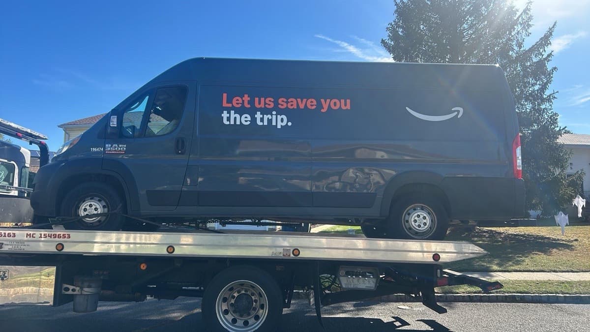 Commercial fleet towing - Amazon delivery van on flatbed